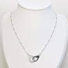 Handcuff necklace in silver and white steel