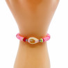 Bracelet Heishi coloris rose clair avec coquillage