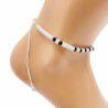 White anklet with black beads