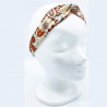 Diadema con lazo floral beige