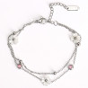 Bracciale in acciaio inossidabile placcato argento con fiori e strass